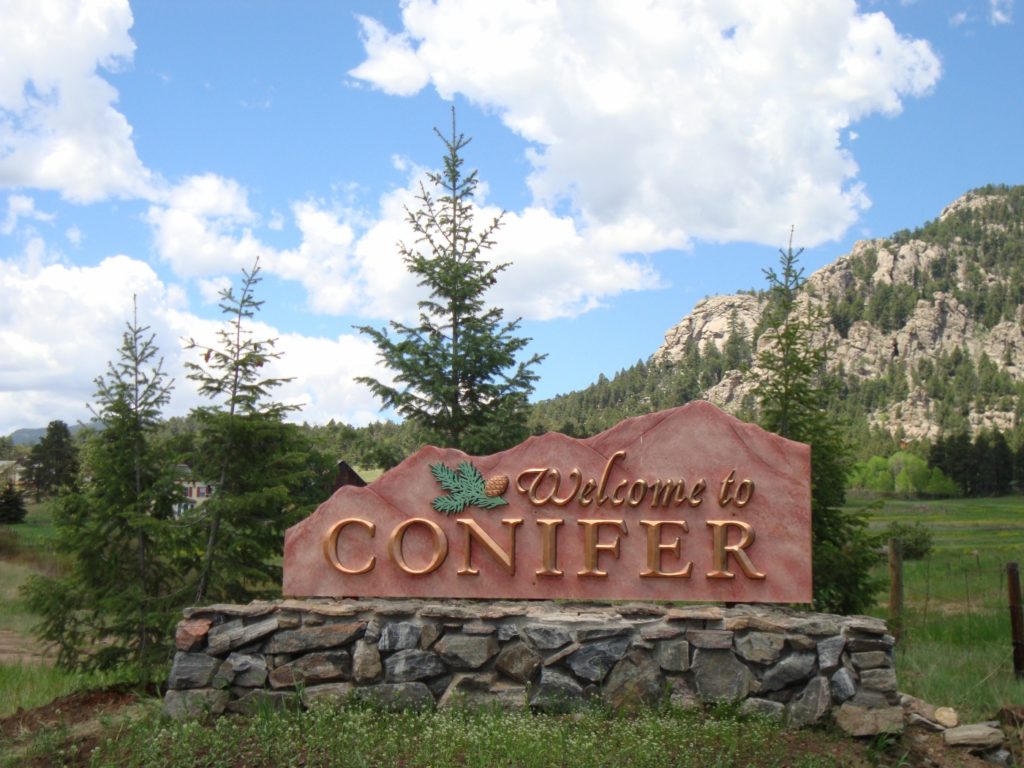 welcome to conifer sign